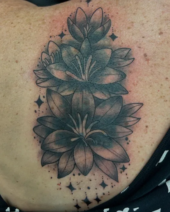 Lilies cover-up, tattooed by Tabitha at Inkwell Tattoo Studio, Blaydon