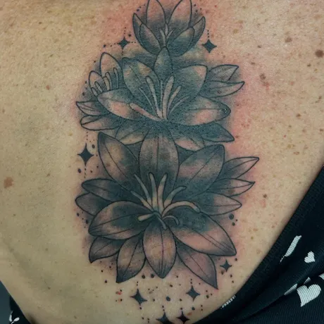 Finished: Lilies over an old back piece, by Tabitha