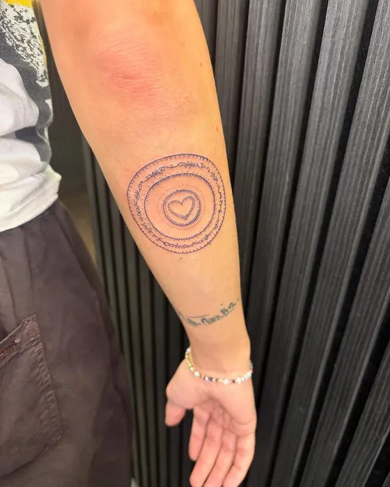 Bullseye, fine line, tattooed by Lucy at Inkwell Tattoo Studio, Blaydon