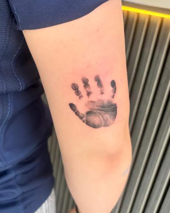 Hand print, tattooed by Lucy at Inkwell Tattoo Studio, Blaydon