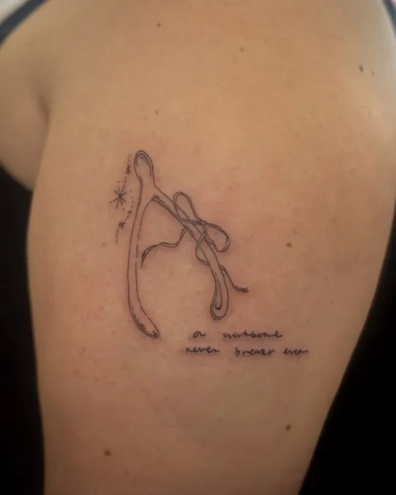 Wishbone, tattooed by Lucy at Inkwell Tattoo Studio, Blaydon
