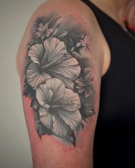 Hibiscus cover-up, tattooed by Luke at Inkwell Tattoo Studio, Blaydon