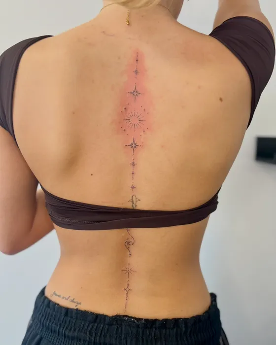 Delicate spine piece, tattooed by Luke at Inkwell Tattoo Studio, Blaydon