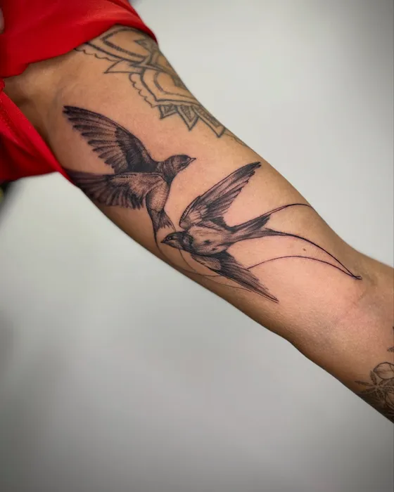 Swallows, inner bicep, tattooed by Luke at Inkwell Tattoo Studio, Blaydon