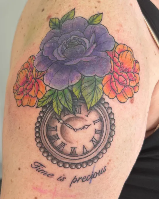 Rose & clock cover-up, tattooed by Tabitha at Inkwell Tattoo Studio, Blaydon