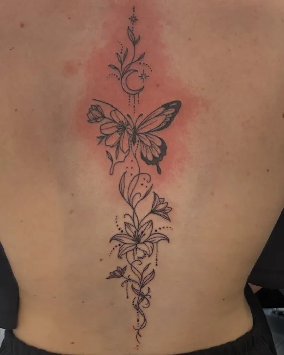 Butterfly spine, tattooed by Tabitha at Inkwell Tattoo Studio, Blaydon