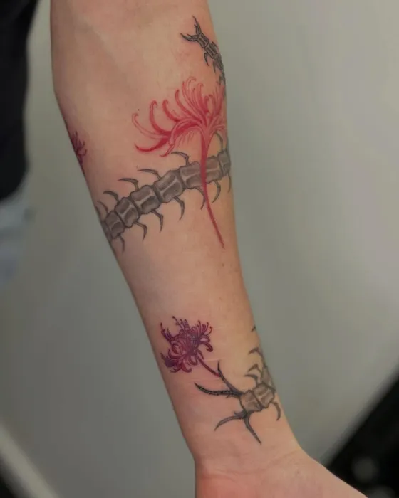 Centipede & red spider lilies, tattooed by Tabitha at Inkwell Tattoo Studio, Blaydon