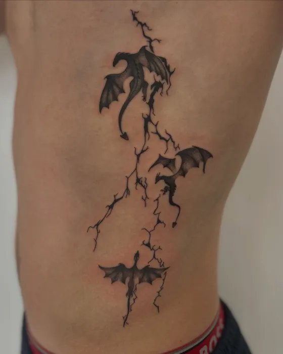 Dragons & lightning, ribs, tattooed by Tabitha at Inkwell Tattoo Studio, Blaydon