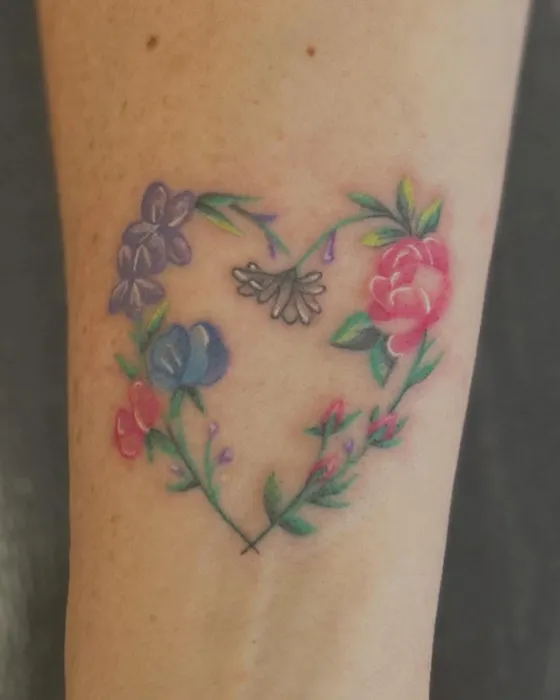 Floral heart, refreshed, tattooed by Tabitha at Inkwell Tattoo Studio, Blaydon
