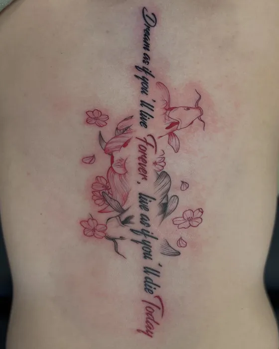 Black & red script spine, tattooed by Tabitha at Inkwell Tattoo Studio, Blaydon